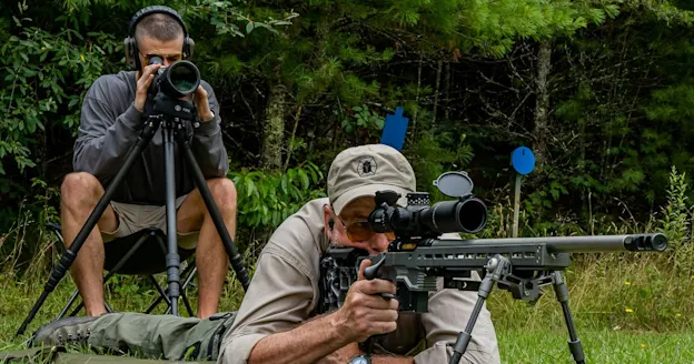 Long range shooter working with a spotter