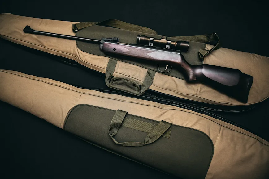 Scoped Rifle with two gun cases