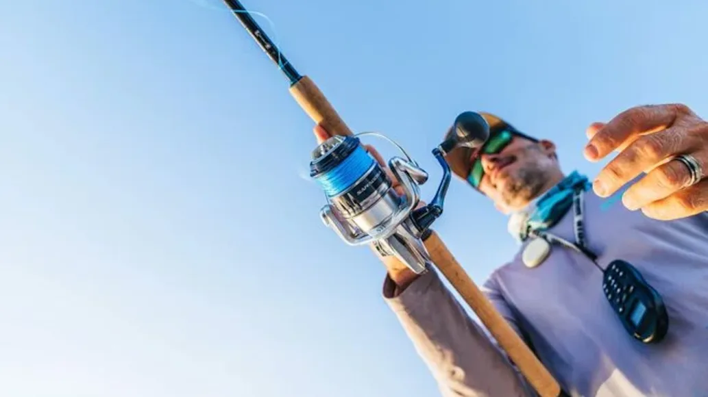Angler casting Shimano Saragosa Spinning Reel