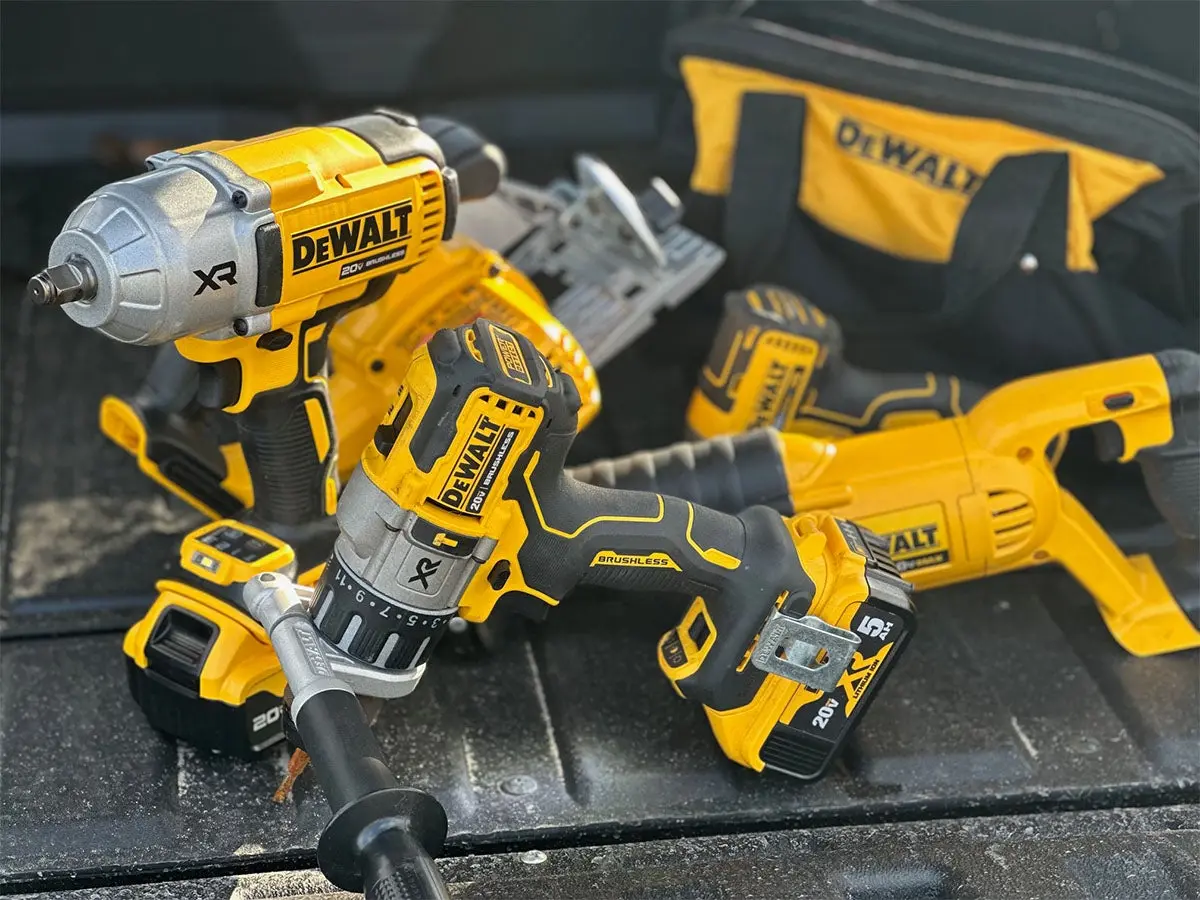 Dewalt powertools in the bed of a Honda Pioneer