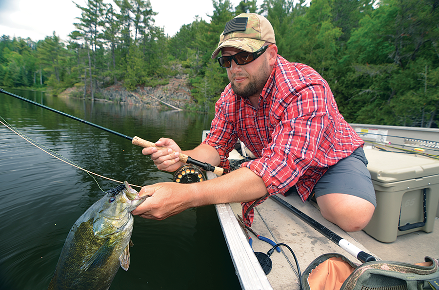 Landing a smallie.