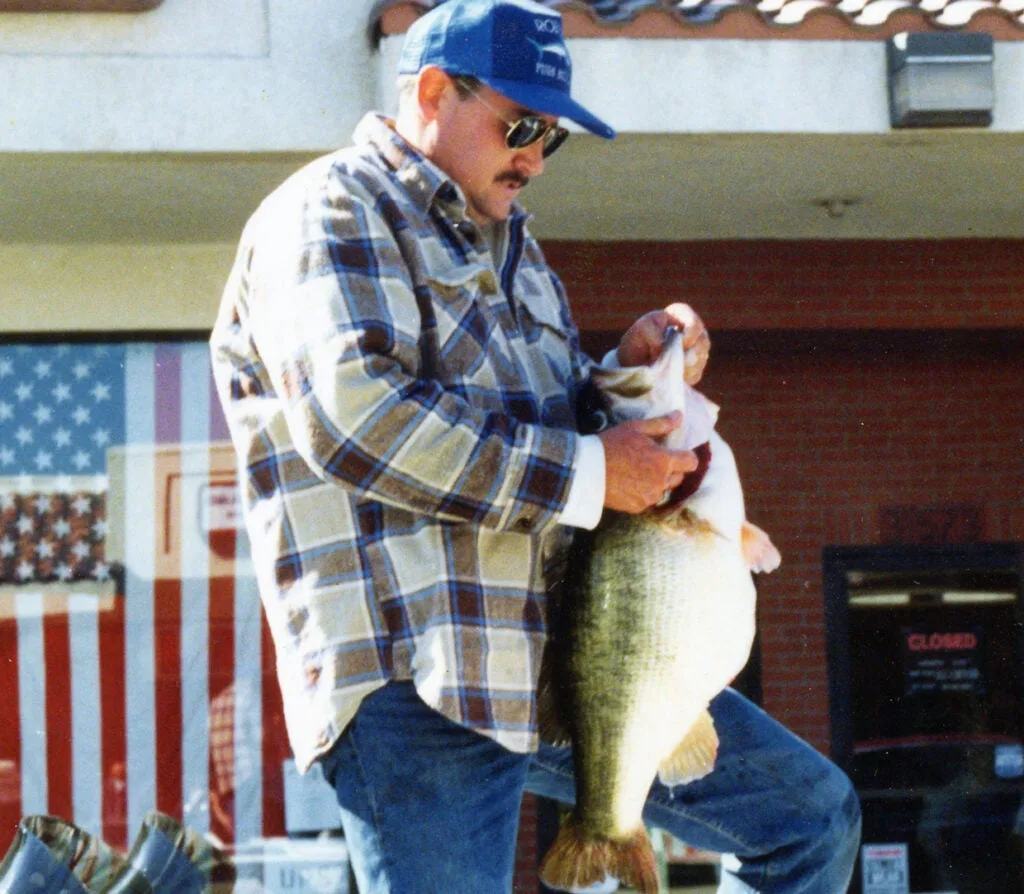 fisherman holding big fish. 