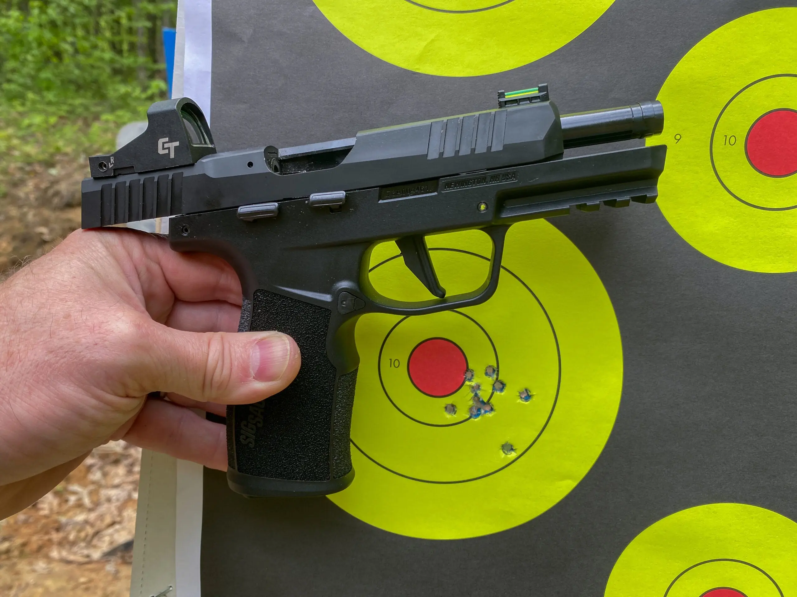 Close-up of .22 pistol in front of target