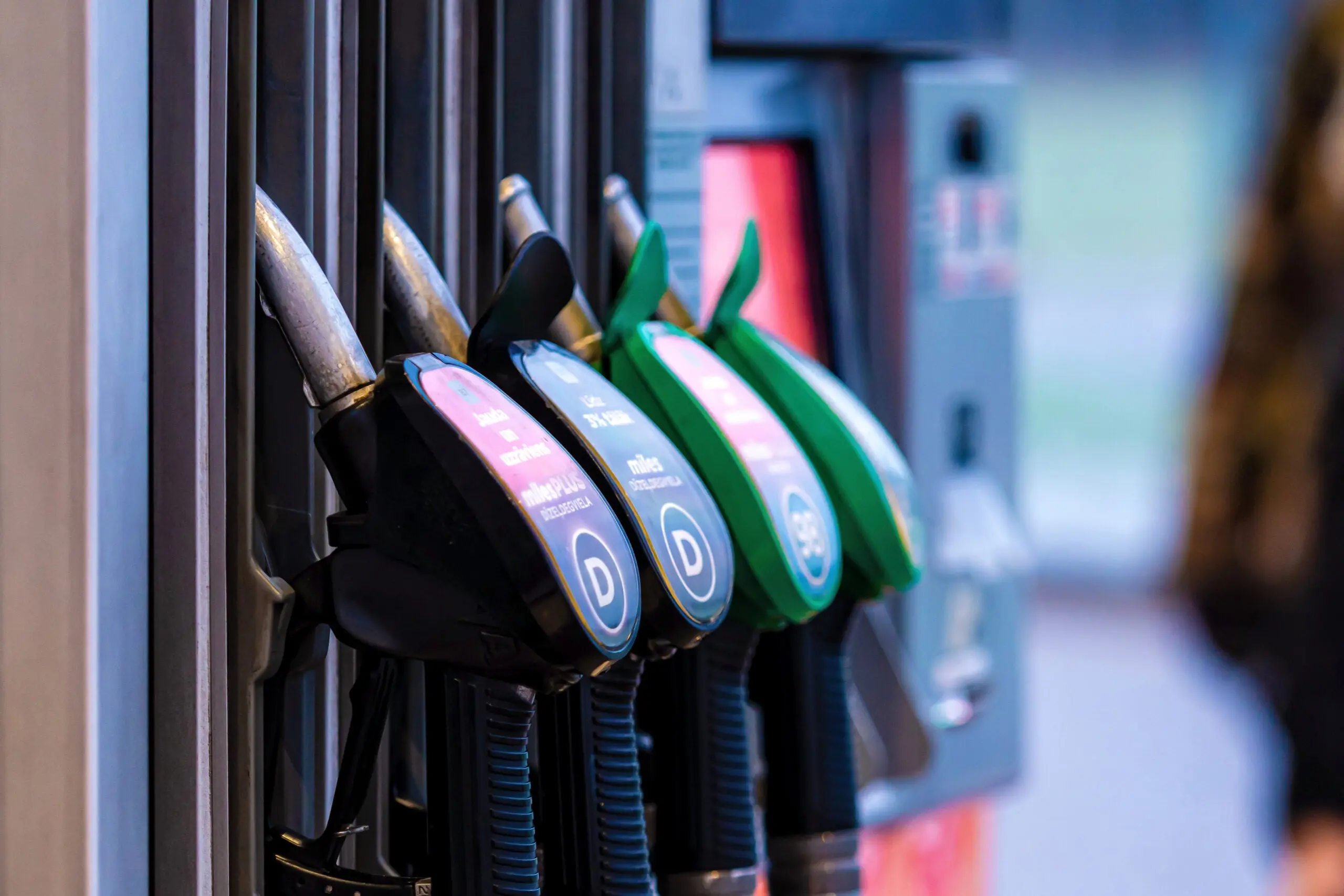 Close up of gas and diesel pumps at a gas station