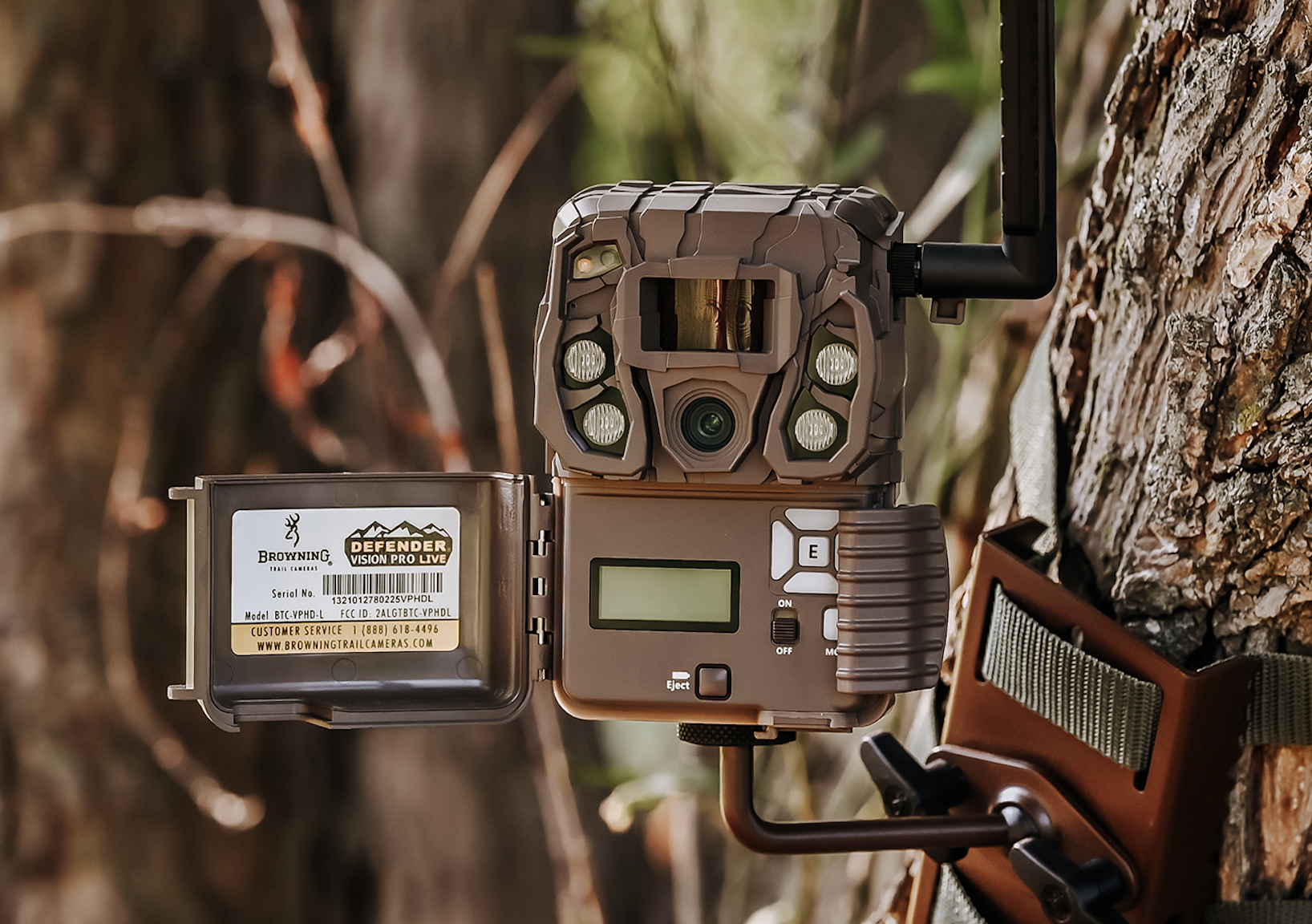 Browing Defender Vision Pro LiveStream trail camera mounted to a tree.