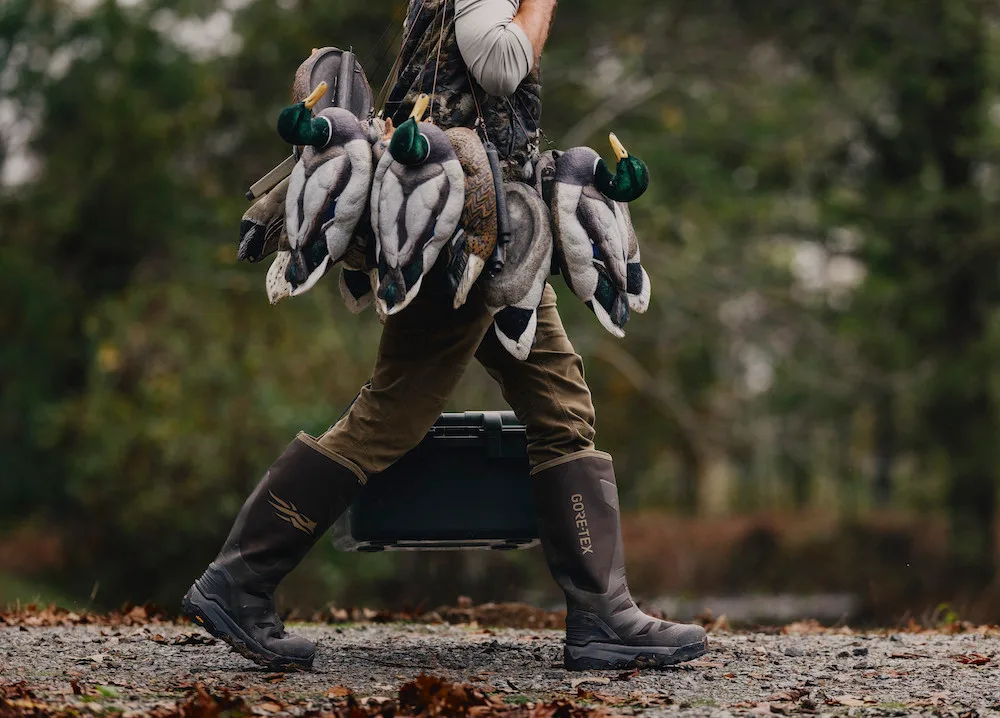 Duck hunter wearing Sitka VentLite GTX Boots in Earth