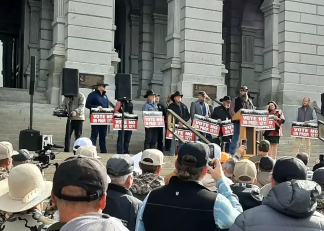 Hunters gather outside the Captitol Building in Denver, Colorado to oppose Proposition 127. 