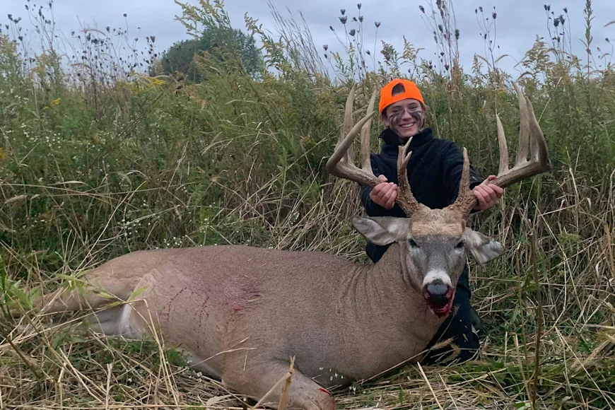 A 13-year-old hunter poses with a trophy buck taken in Indiana.