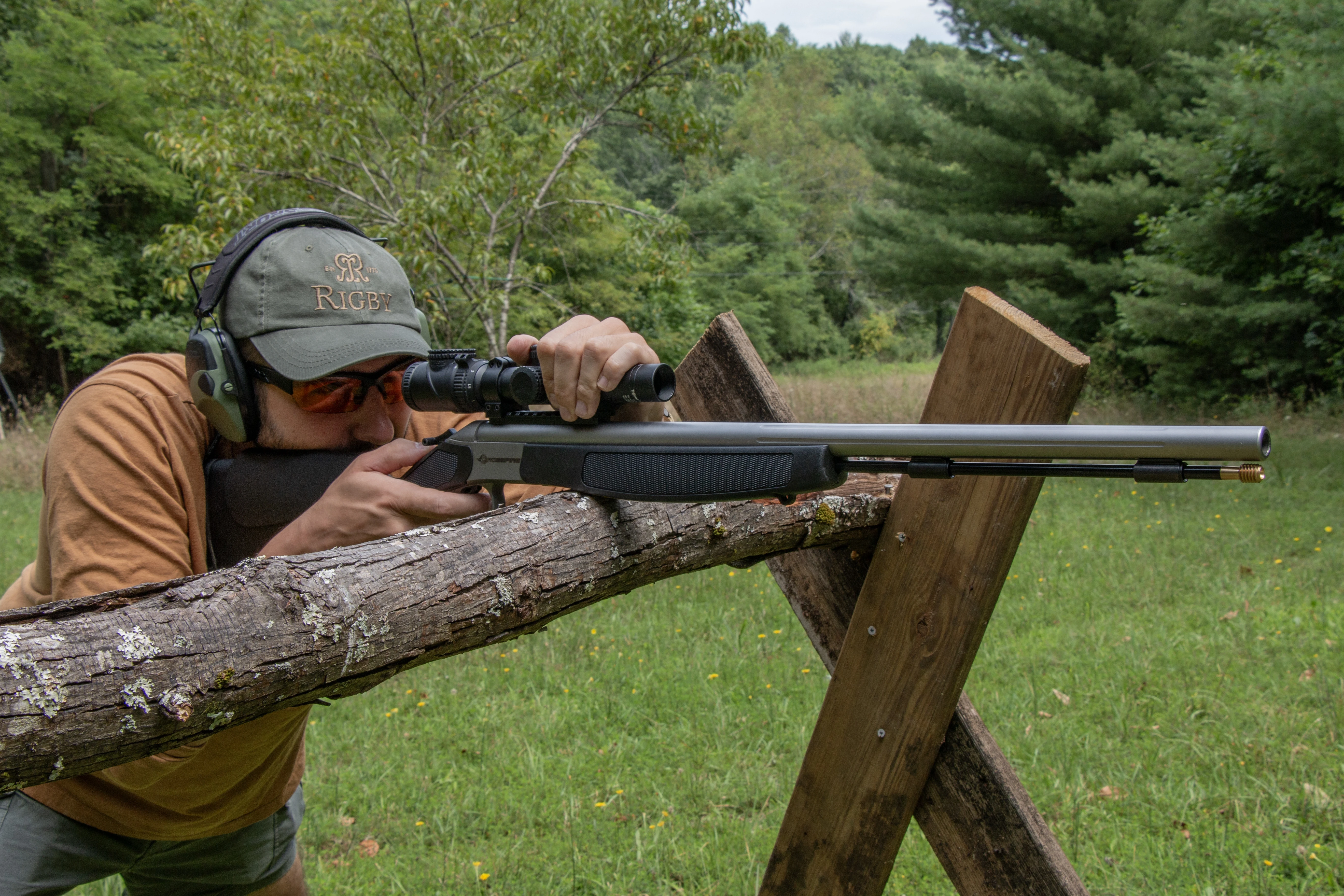 A shooter test fires the new CVA Crossfire muzzleloader rested on a barricade. 