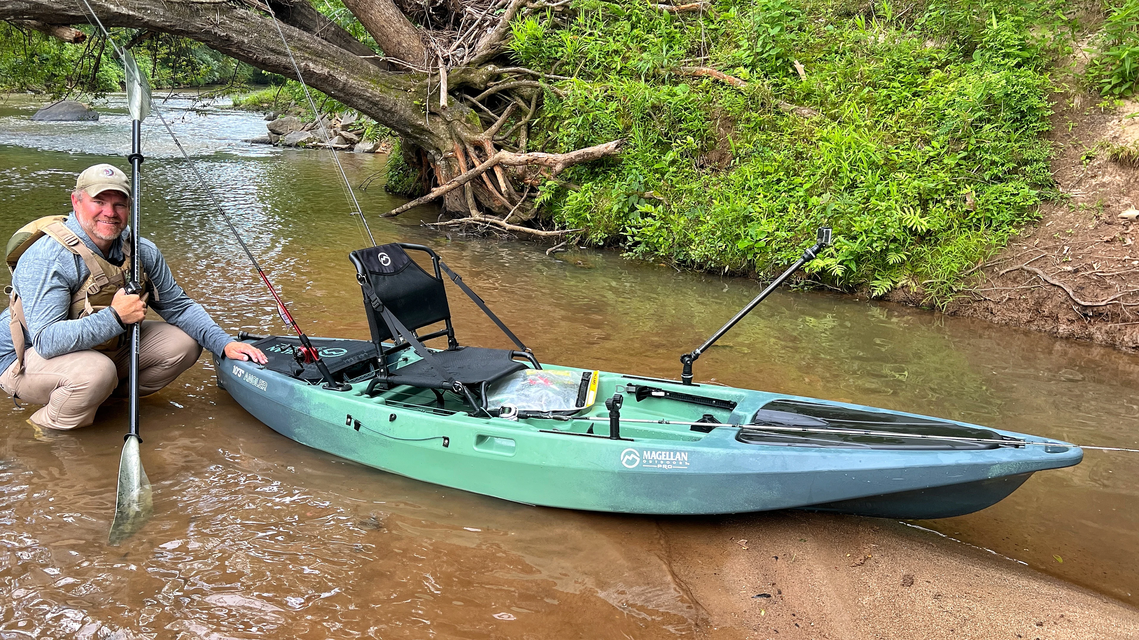 Angler next to kayak