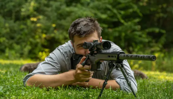 photo of shooter testing the new Nosler Carbon Chassis Hunter rifle