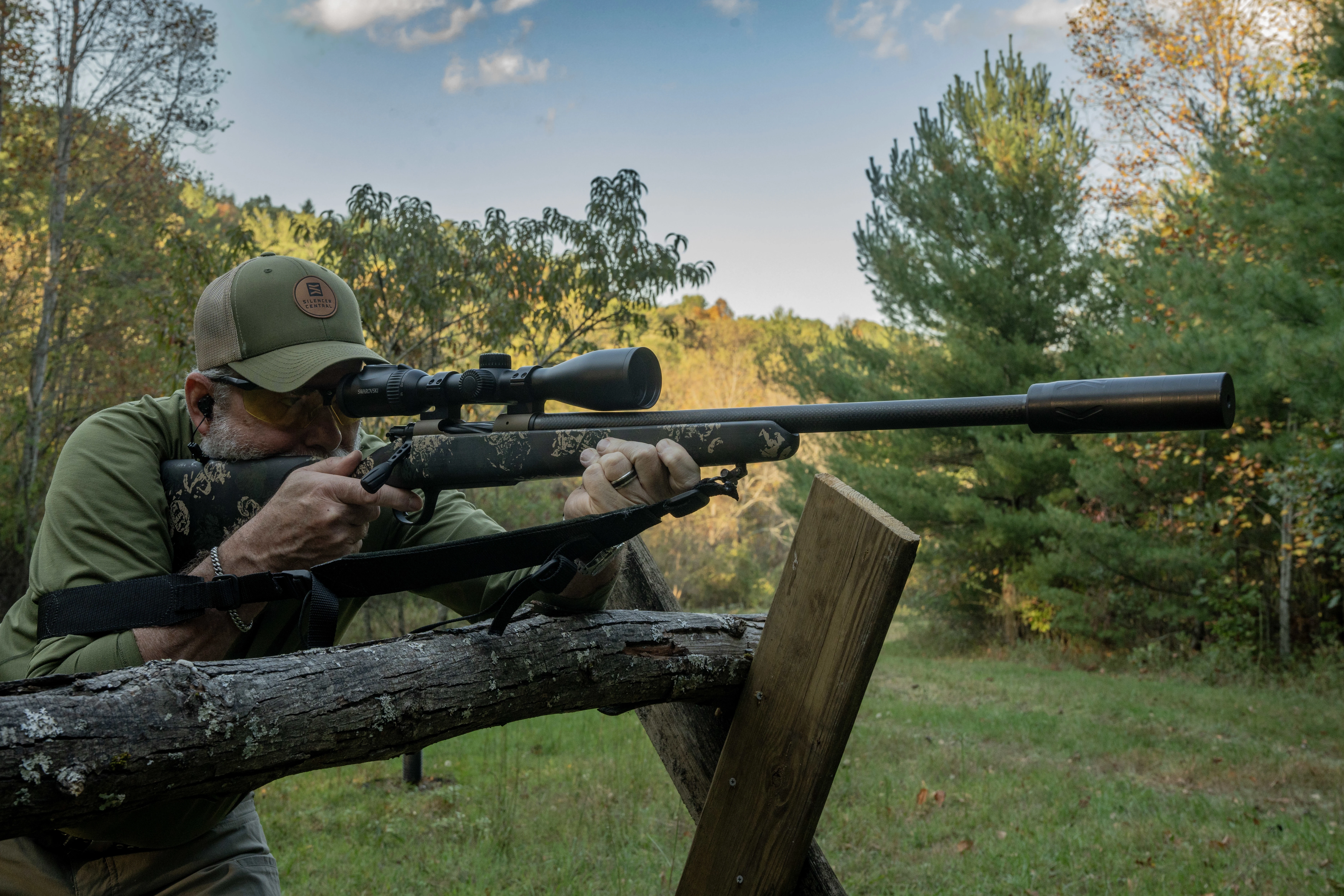 A shooter fires the Christensen Ridgeline FFT bolt-action rifle from a barricade. 