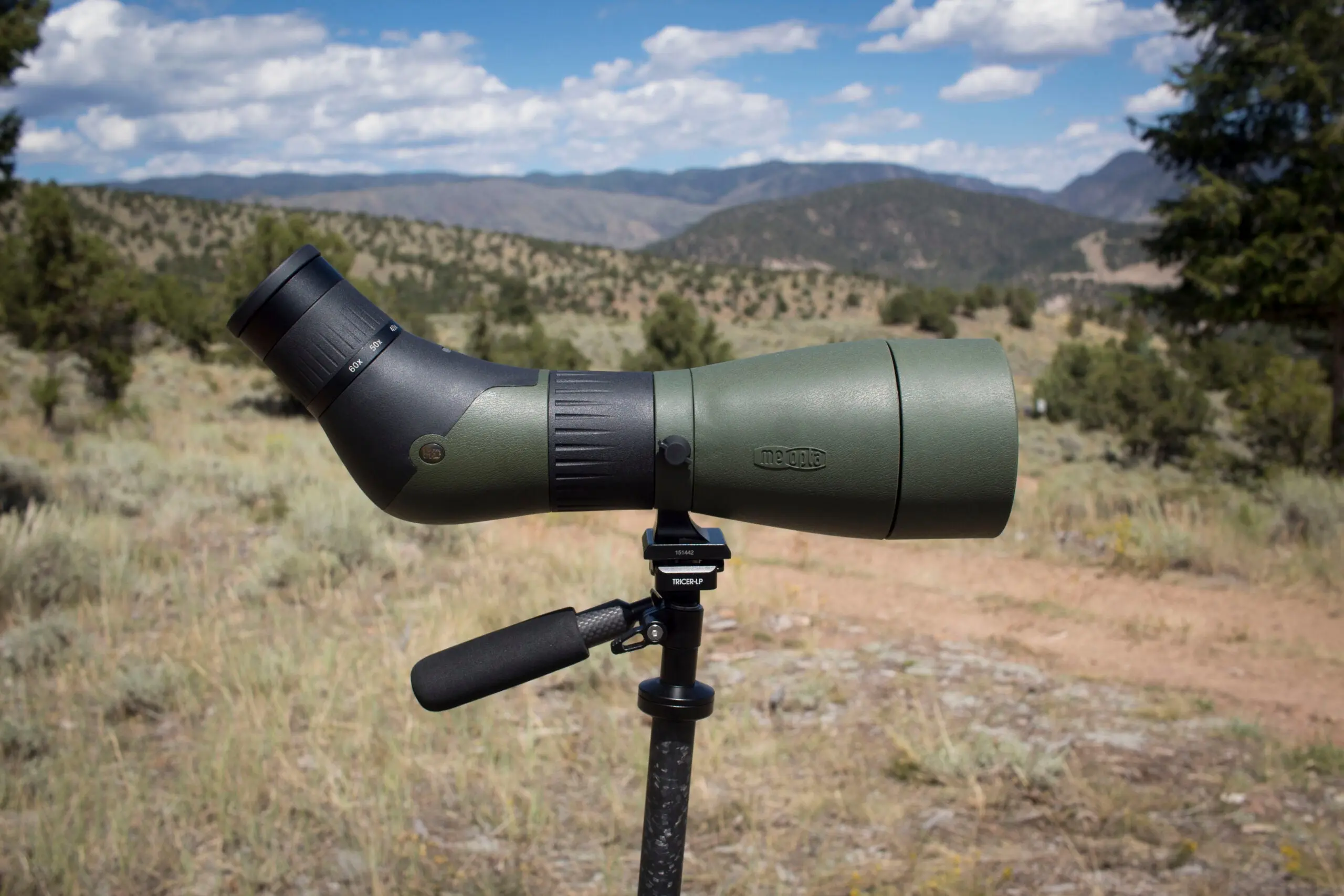 Meopta MeoPro spotting scope on tripod with mountains in the background