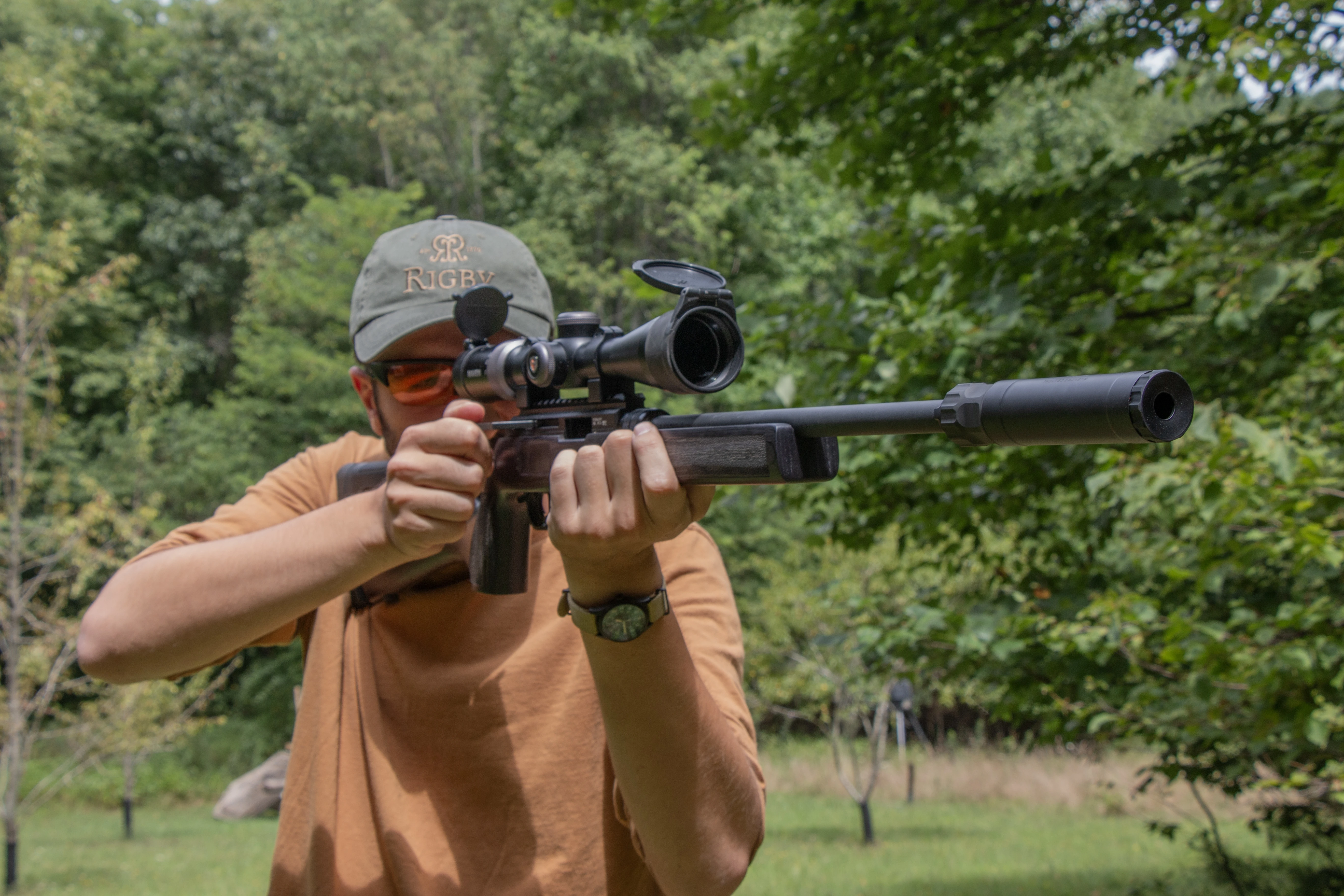 Shooter firing the Hammerli Arms Force B1 from the off-hand position.