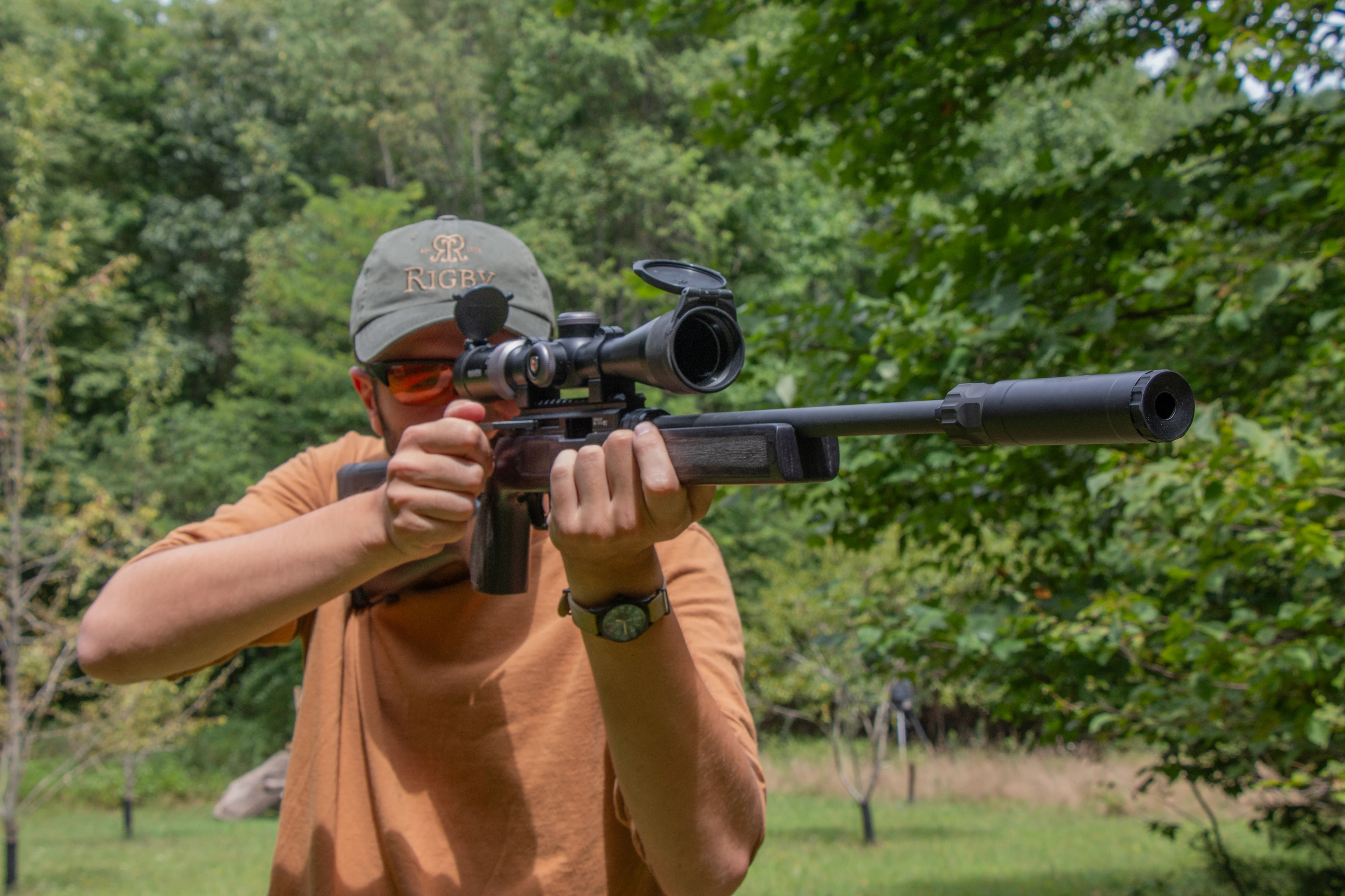 Shooter firing the Hammerli Arms Force B1 from the off-hand position.