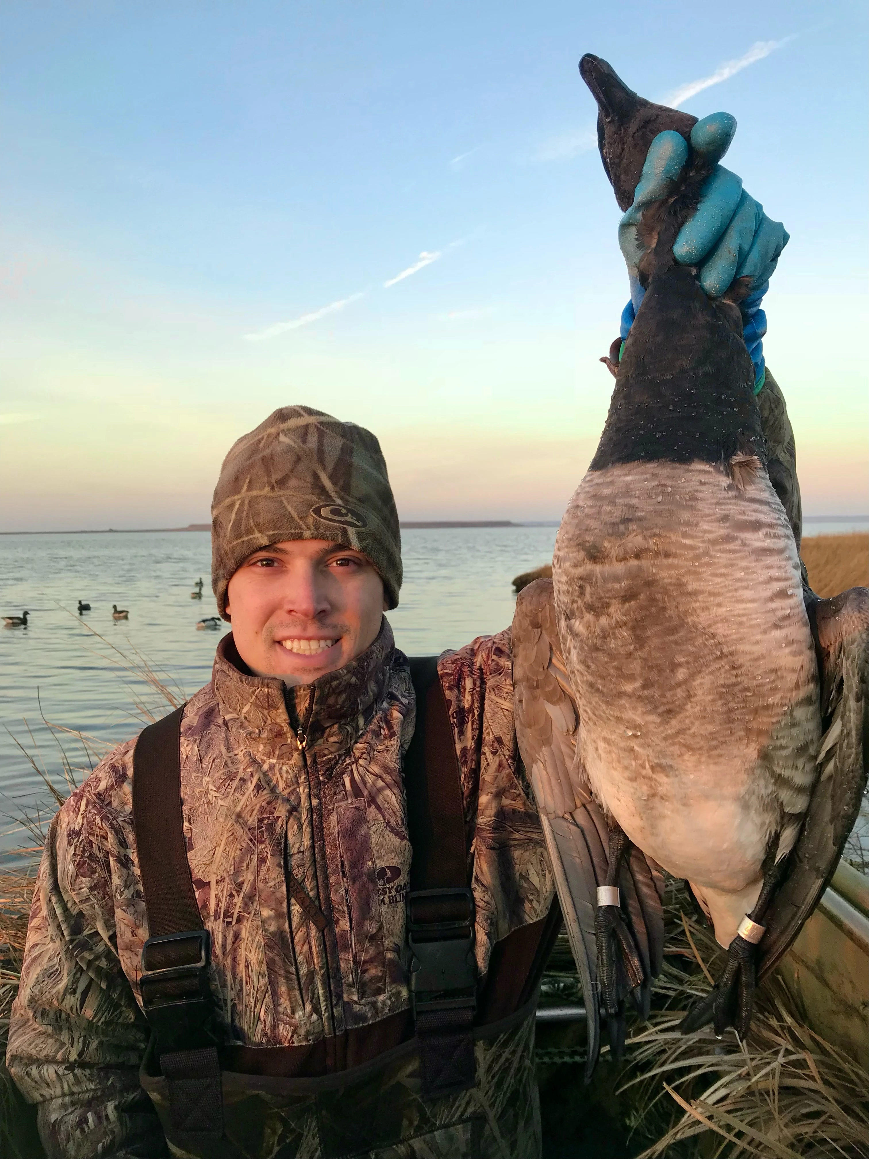 Hunter holds up a double banded Atlantic brant