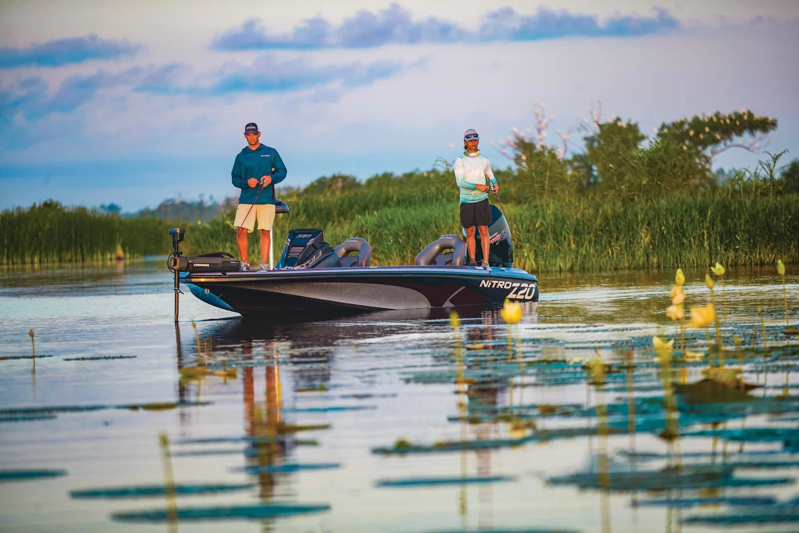 Fishermen casting off of bass boat