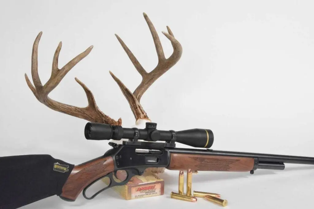 a 45-70 springfield rifle and deer antlers