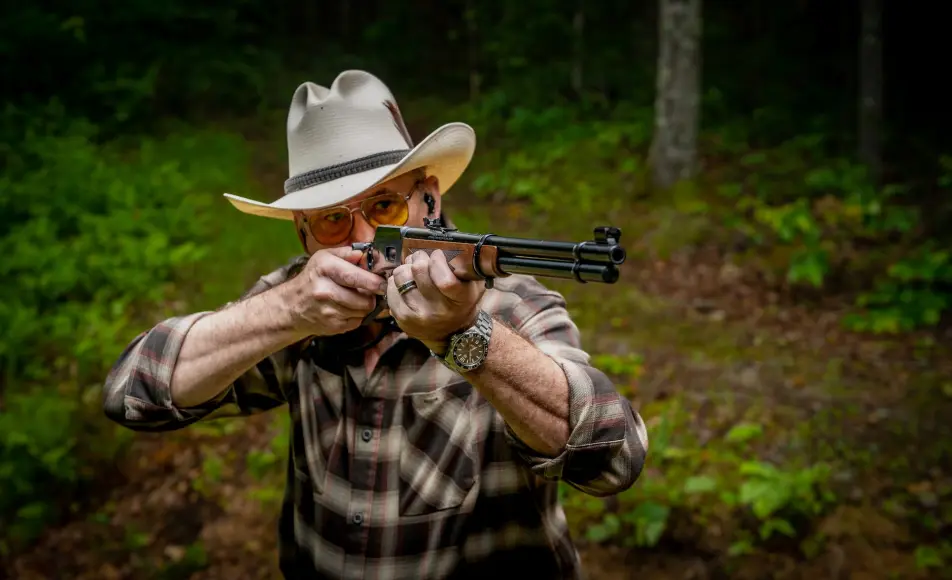 Man shooting a Marlin 1894.