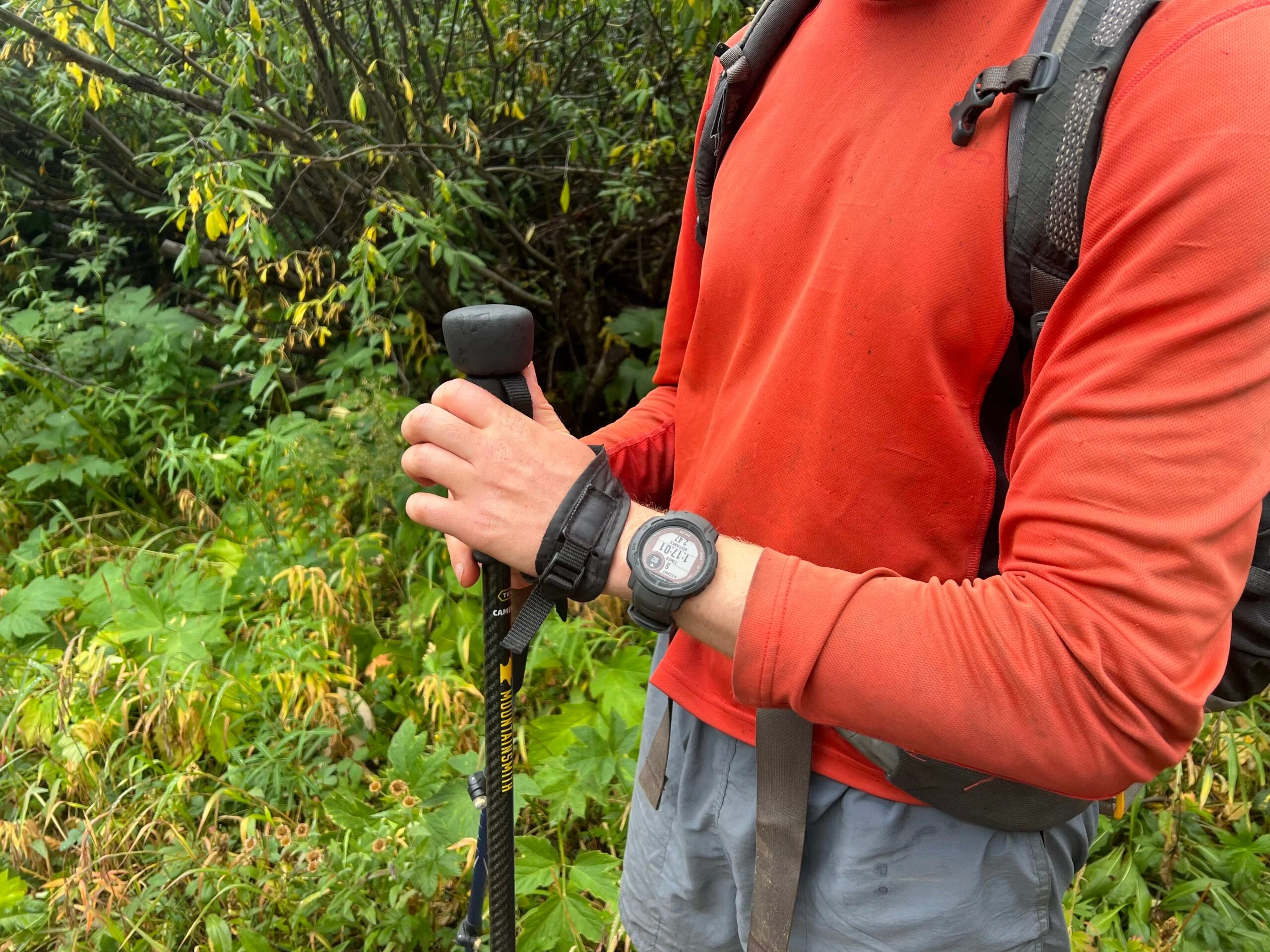 Hiker wearing Garmin Instinct 2 GPS Watch