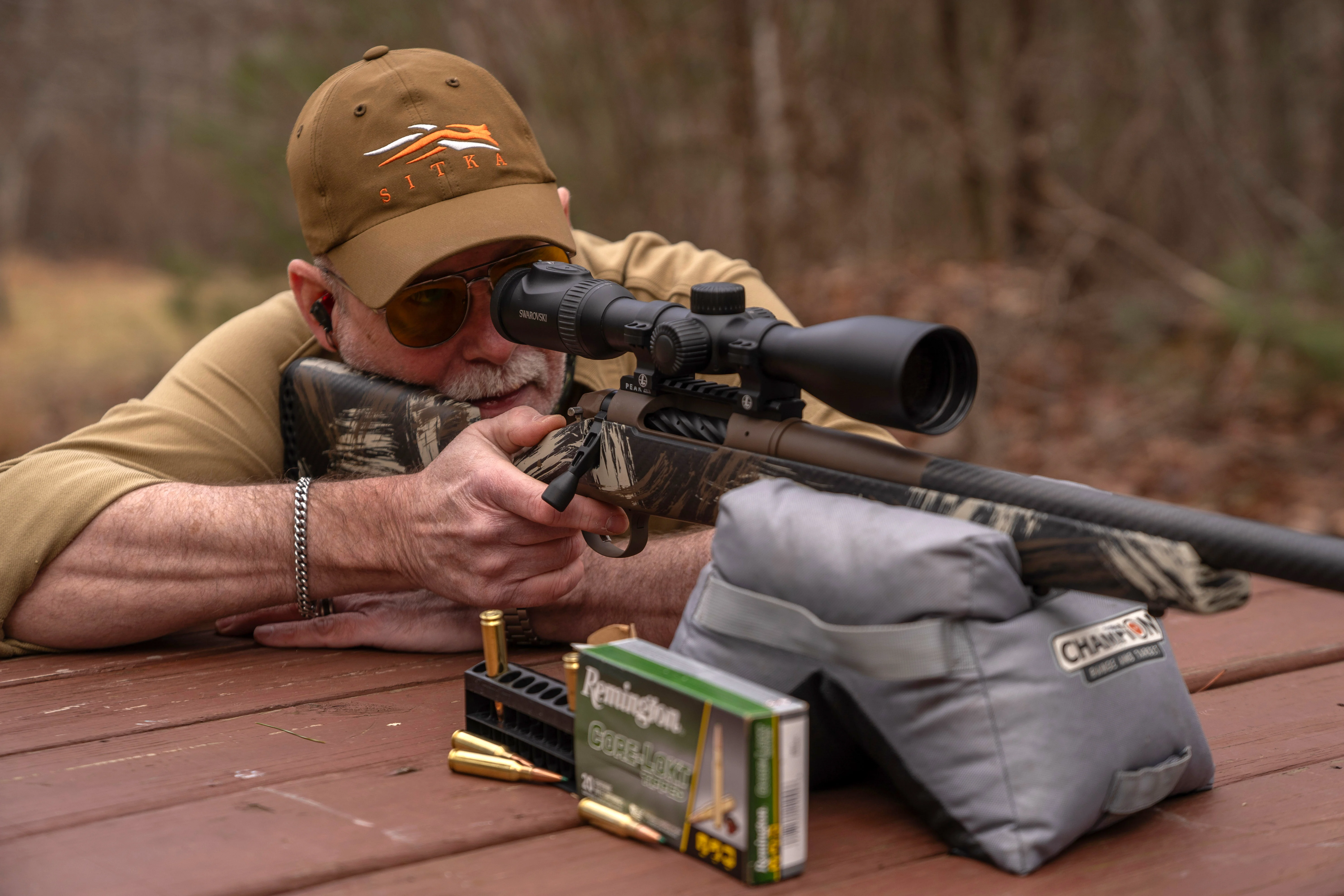 A shooter fires the new Weatherby Model 307 Alpine CT from a bench rest. 