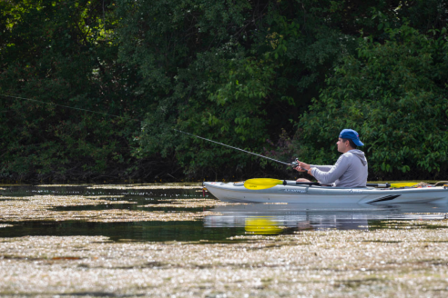 Angler with baitcaster