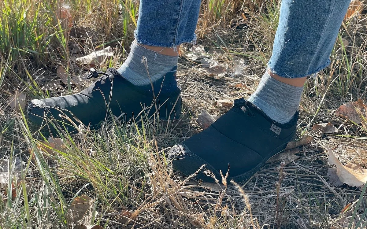 Woman wearing Keen Howser III Slide Slippers outdoors