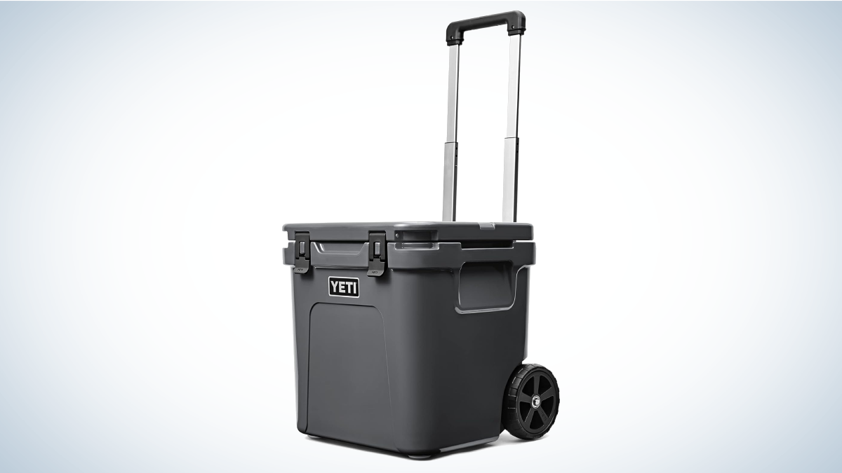 Yeti Wheeled Roadie on gray and white background