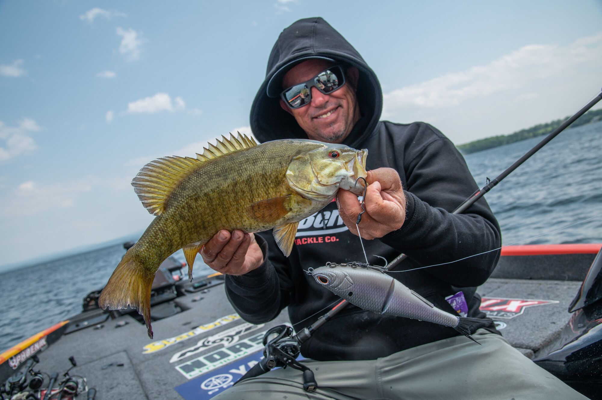 Angler holding smallmouth bass
