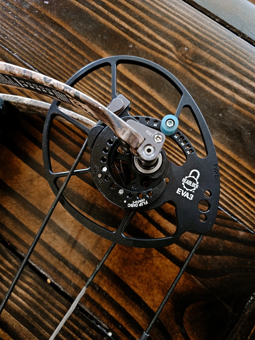 Close-up of the Deadlock cam system on the Bowtech Eva Gen3 compound bow