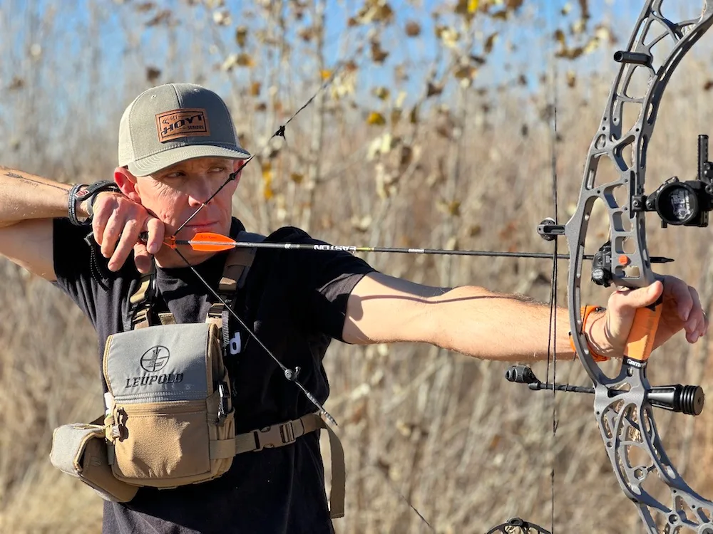 Man shooting Hoyt compound bow