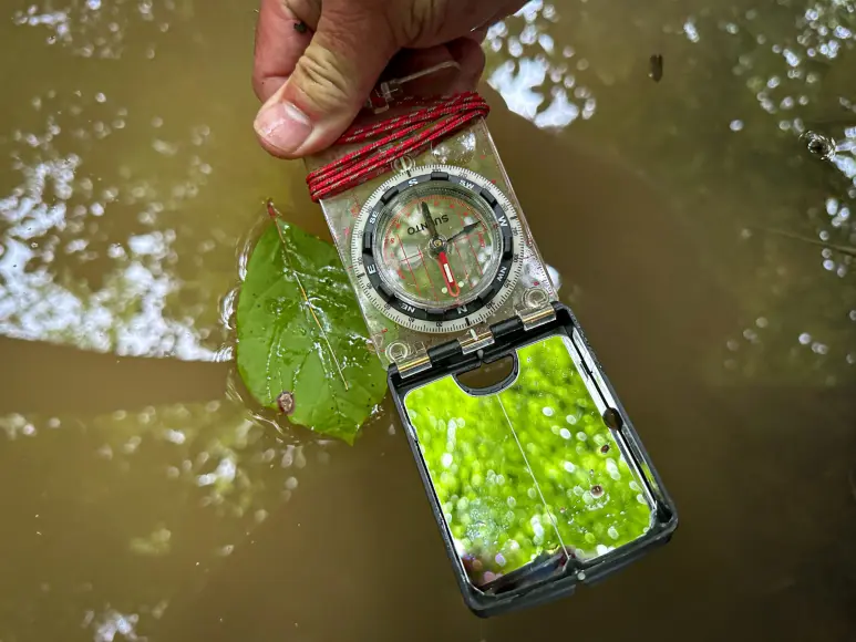 how to make a compass with a left and a piece of metal