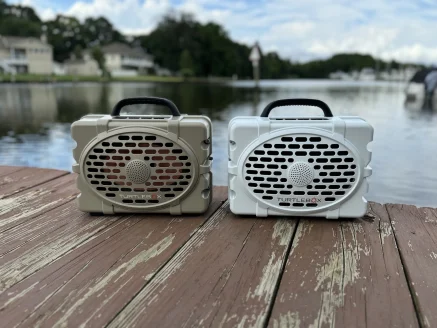 Turtlebox speakers sitting on pier