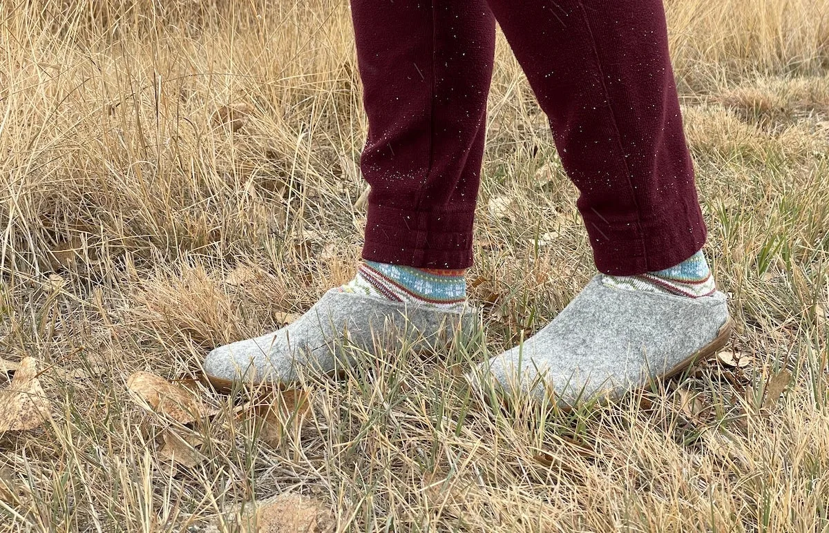 Woman wearing Glerups Wool Slip-On slippers outside