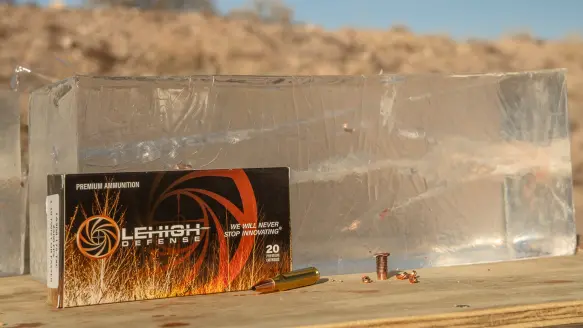 Lehigh Defense Tipped Xtreme Chaos Hunting ammo on a table with ballistics gel in background.
