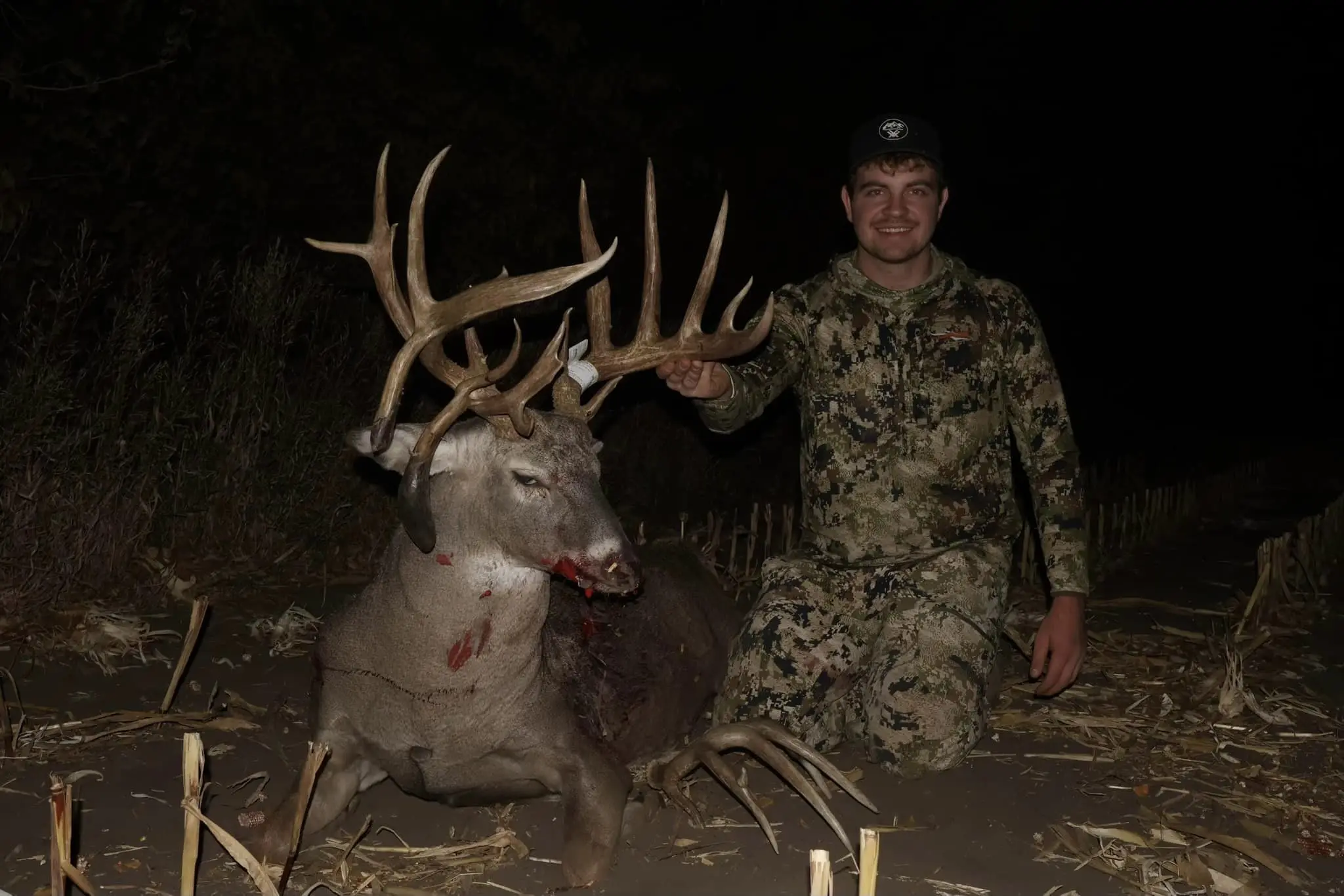 An Iowa bowhunter poses with a massive buck taken in mid-October. 