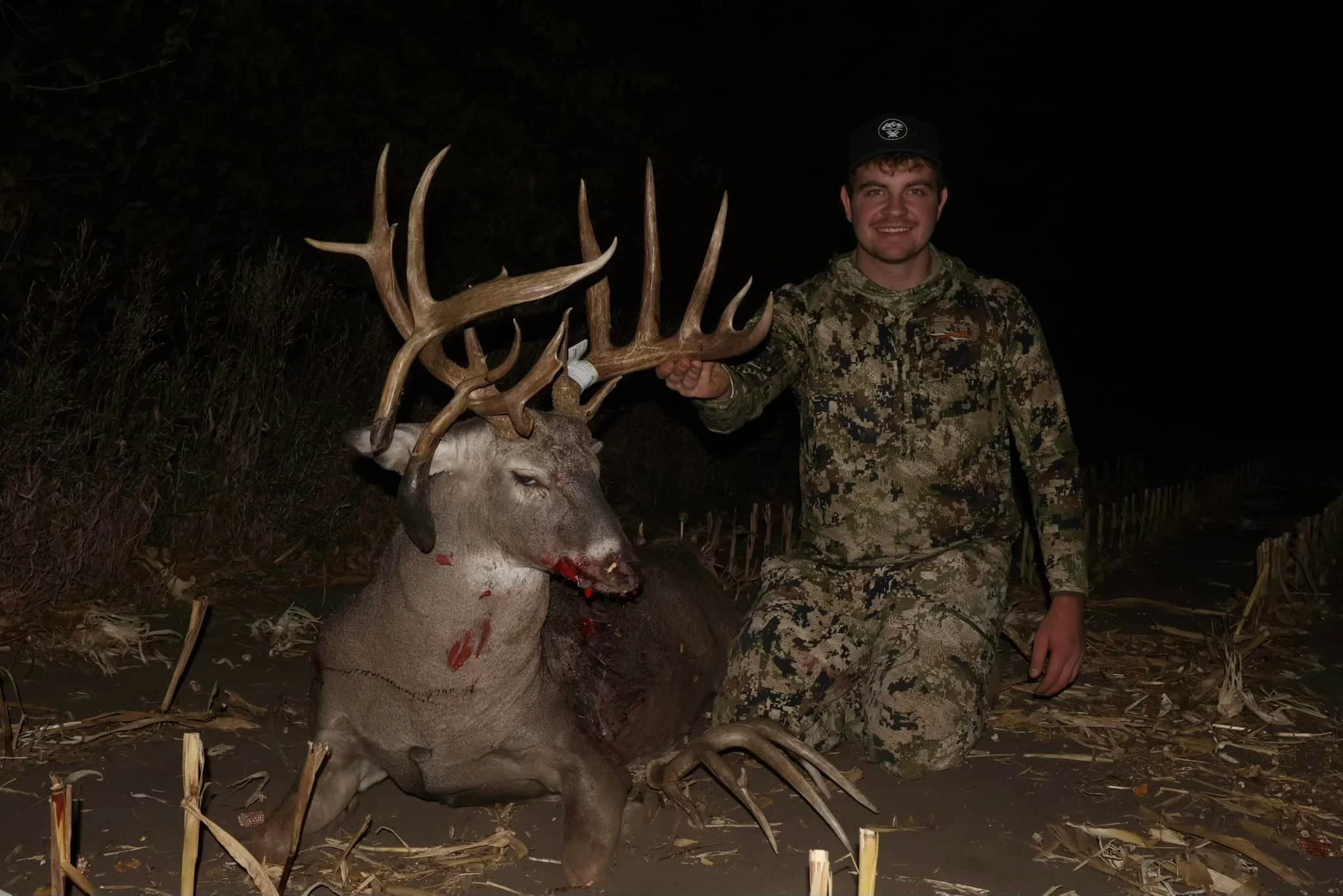 An Iowa bowhunter poses with a massive buck taken in mid-October. 