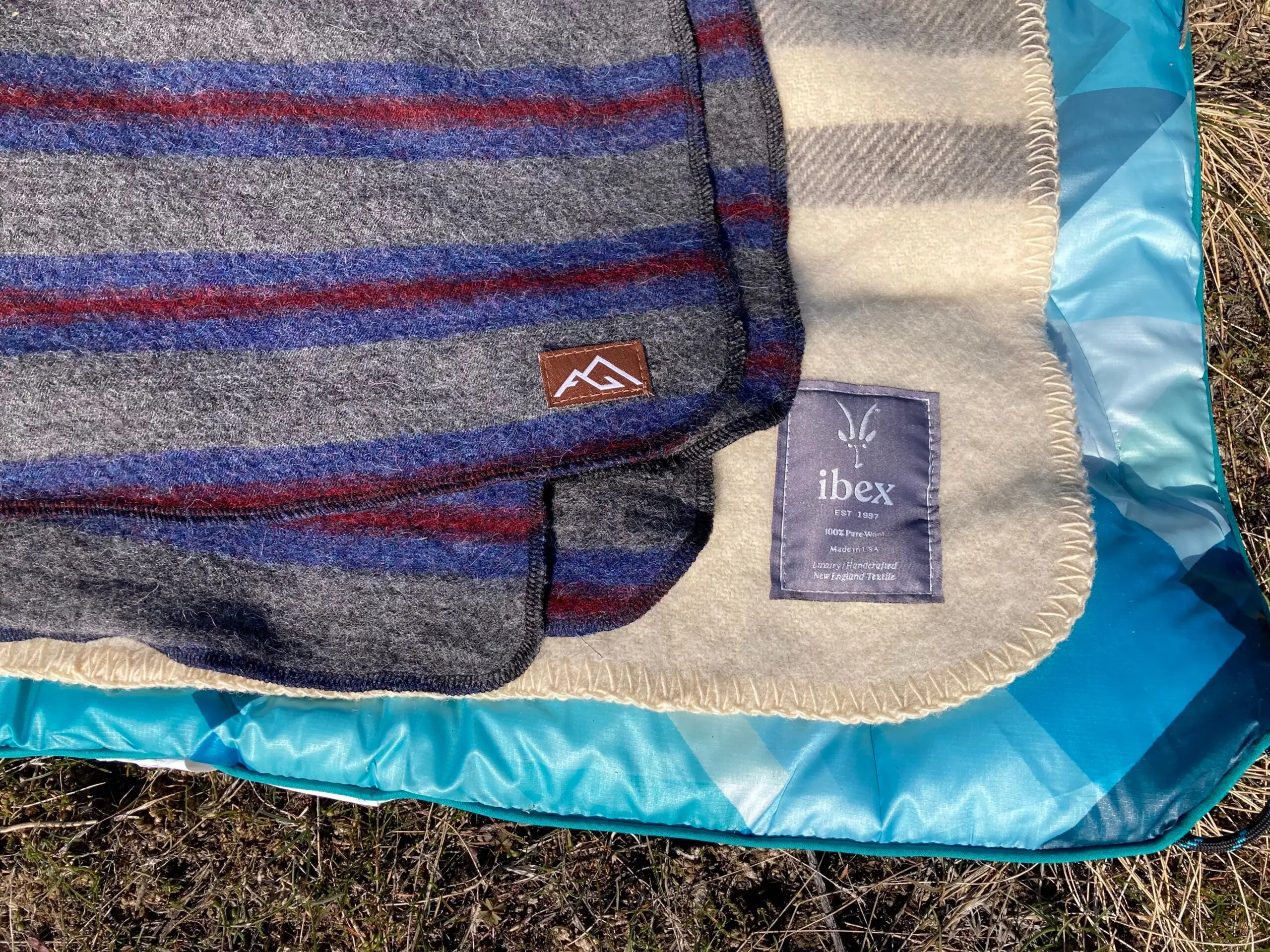 The All-Paca Blanket (left) during testing for the best camping blankets