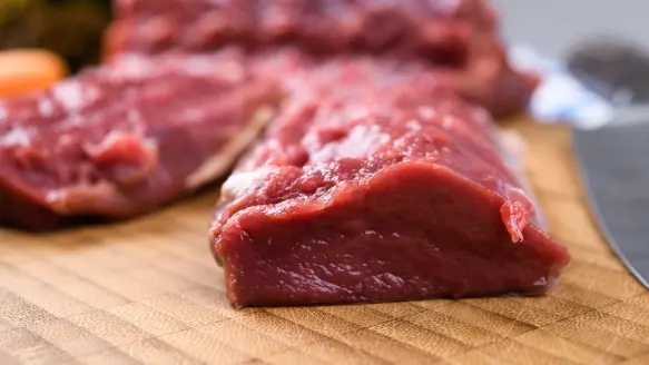 photo of a venison on a cutting board