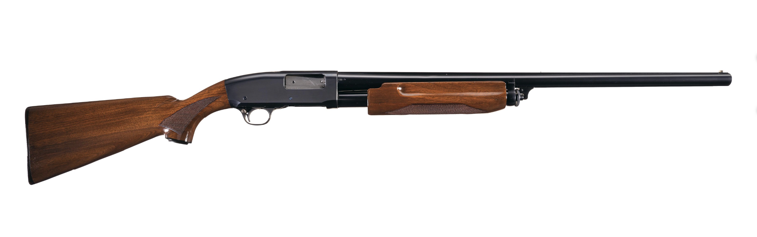 A Remington Model 31 pump-action shotgun on white background. 