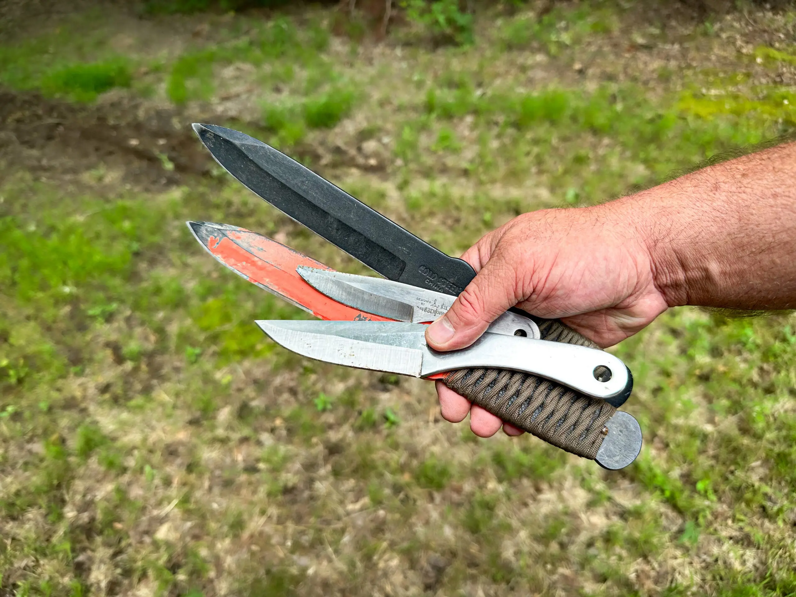 An assortment of throwing knives