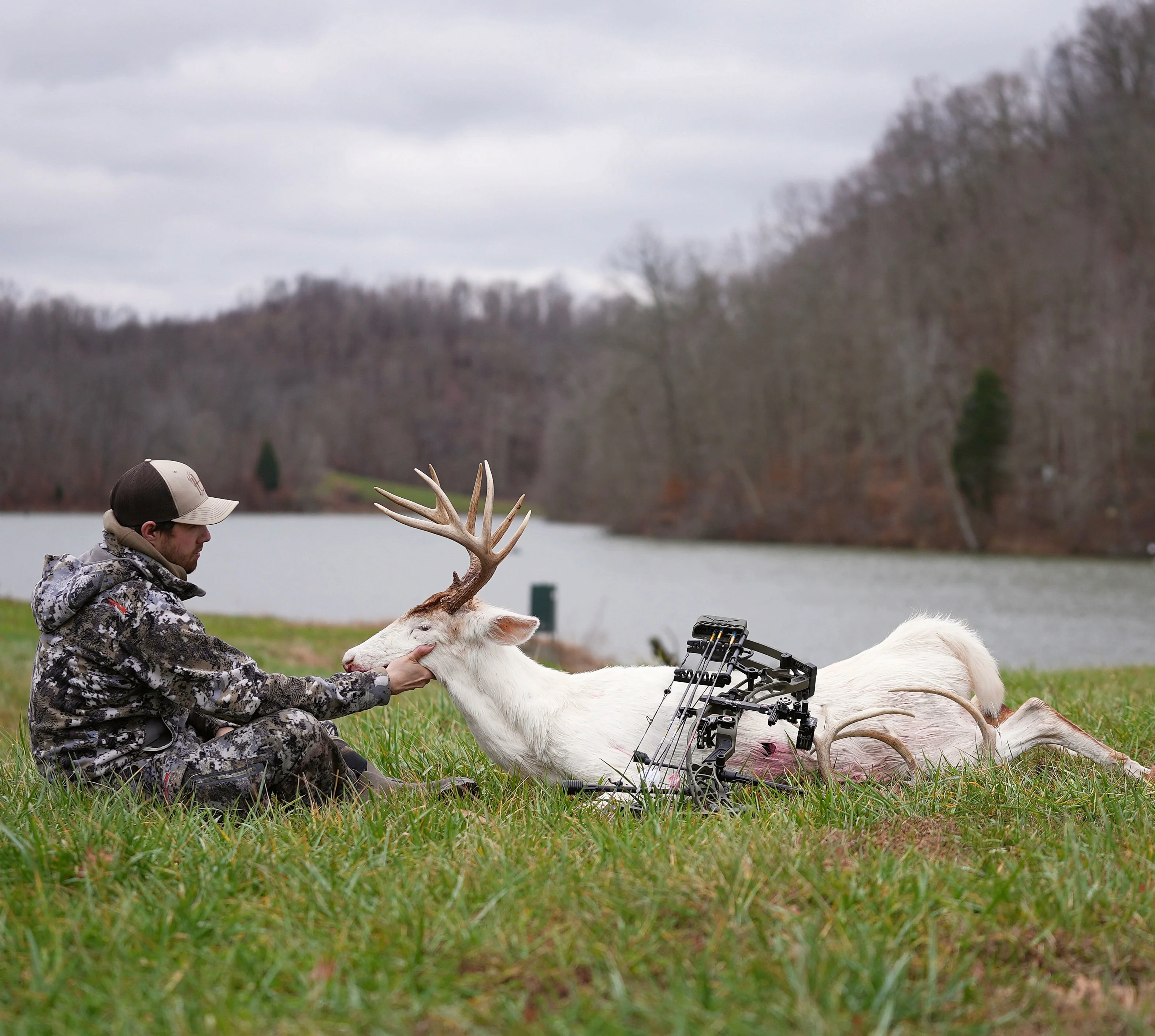 A bowhunter poses with an albino buck taken in Kentucky. 