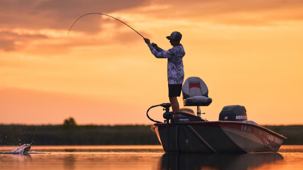 Angler fishing with KastKing rod on boat