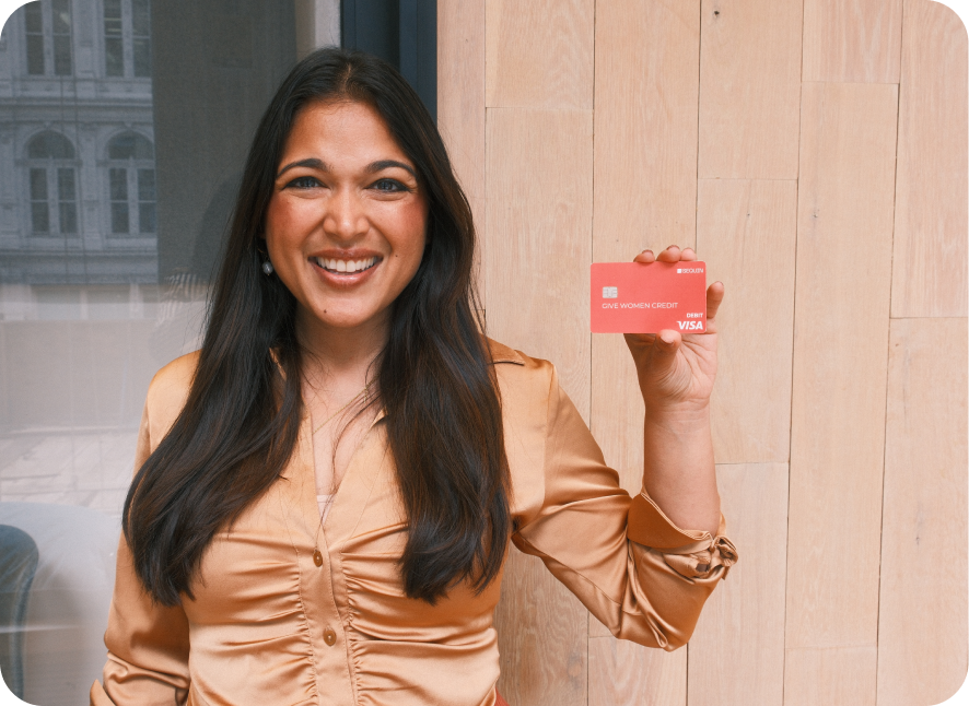 Vrinda Gupta Holding a Sequin Rewards Card that Says Give Women Credit