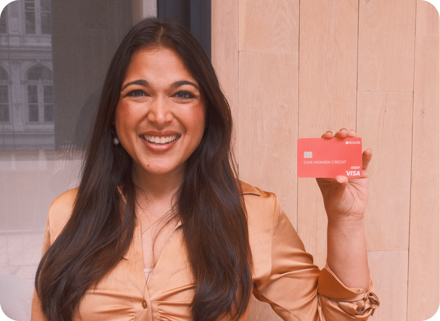 Vrinda Gupta Sequin CEO holding card that says Give Women Credit