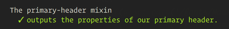 Console output that shows a passing test with the text 'The primary-header mixin outputs the properties of our primary header.'