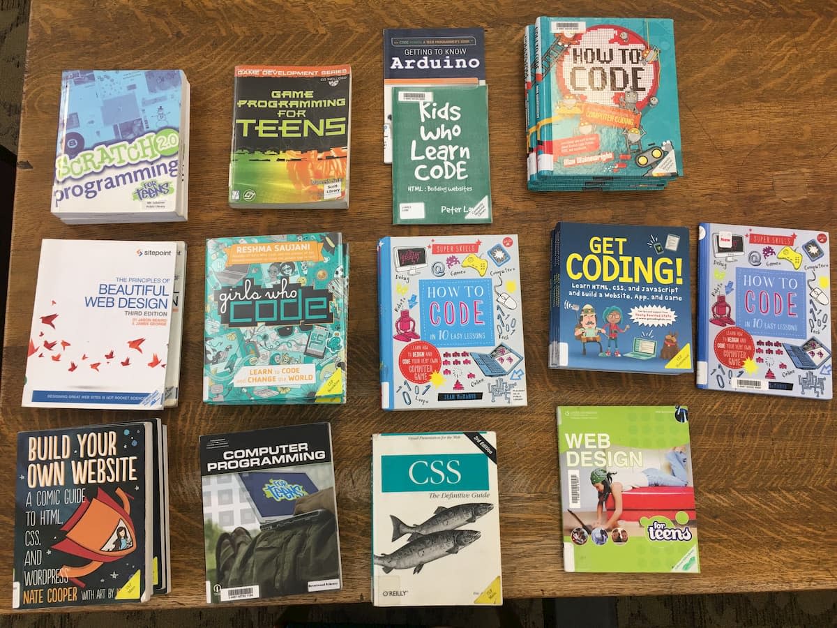 Coding books displayed on a tabletop at the library