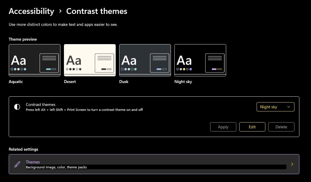 A screenshot of the Windows 11 accessibility settings for Contrast themes, showing with the Night sky theme applied
