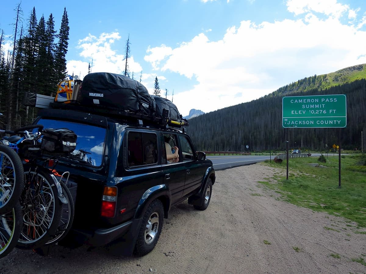 Our truck loaded with gear next to the highway in the mountains