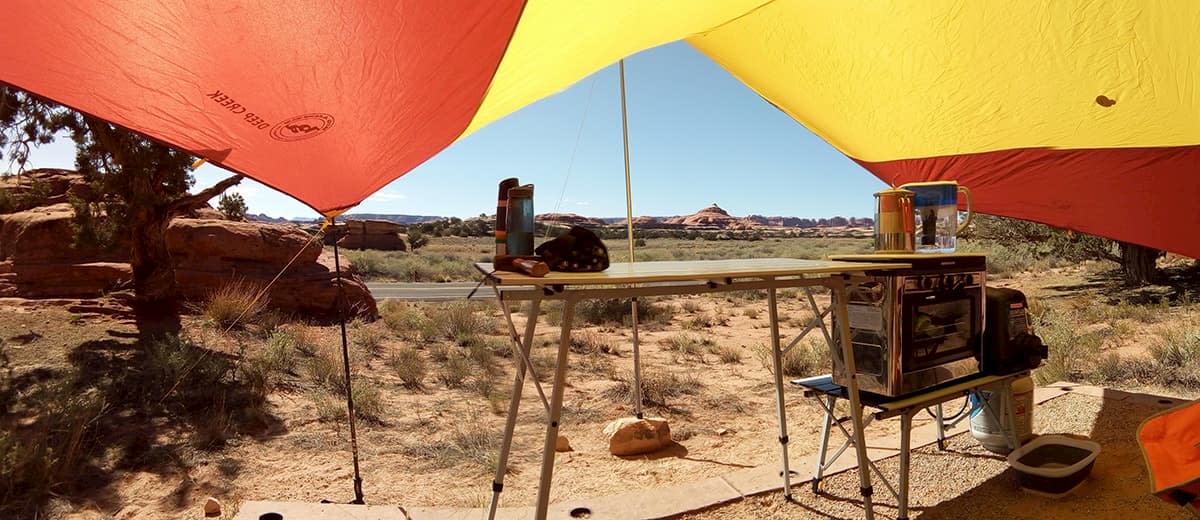 Camp kitchen under a tarp